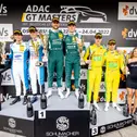 Die strahlenden Sieger auf dem Podium des ADAC GT Masters