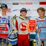Tageswertung beim ADAC MX Junior Cup 125 v.l.n.r.: Leo Diss-Fenard ( Frankreich / KTM / KTM-RPM ), Ryan Oppliger ( Schweiz / KTM / Oppliger Racing Sàrl ) und Jekabs Hudolejs ( Lettland / GasGas / Gates Hudolejs )