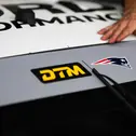 Beim Saisonfinale in Hockenheim tragen alle DTM-Fahrzeuge das Logo der Patriots