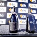 Zum ersten Mal mit Schaumwein von Ralf Schumacher jubeln die DTM-Fahrer auf dem Podium in Oschersleben