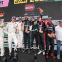Insgesamt sechs Mal stand das Konrad-Duo (4. v.l. Lefterov, 5. v.l. Soufi) wie hier auf dem Norisring ganz oben auf dem Siegertreppchen. Rechts jubelt Teamchef Franz Konrad